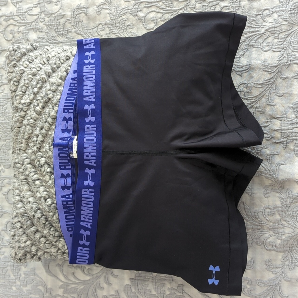 Under Armour black athletic shorts with purple band Size L